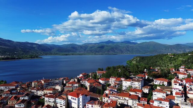 Kastoria Greece beautiful skyline, Lake Orestiada, aerial city buildings orange roof