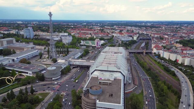 Berlin skyline, radio tower, exhibition grounds. Smooth aerial view flight drone
