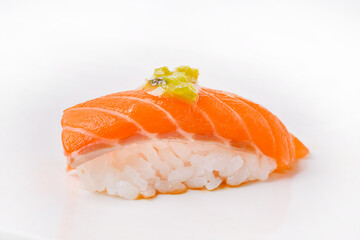 Salmon sushi topped with delicious pickled wasabi, ready to eat.