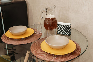 Kitchen table setting, kitchen interior details in natural tones.