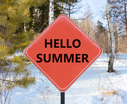 Hello summer symbol. Concept words Hello summer on beautiful red road sign. Beautiful forest trees snow background. Business lifestyle Hello summer concept. Copy space.