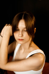 girl posing for the camera with long hair