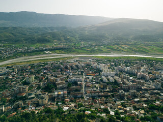 BERAT, ALBANIA, April 13, 2024: Berat castle viewed from boulevard Republika in Albania