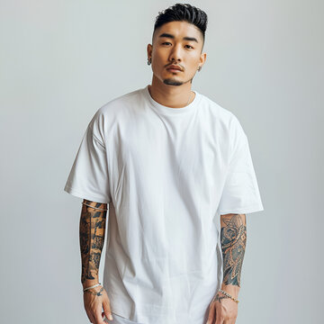portrait of an asian male model with tattoos wearing white oversized t-shirt, cool pose, Chinese man with beard, young Korean boy, fashion model, Gen Z, millennials, Japanese guy with tattooed sleeve
