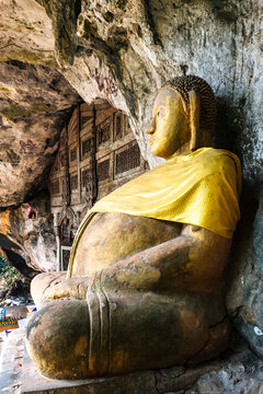 Buddha statue at the entrance of Pak Ou Caves, Luang Prabang, Laos