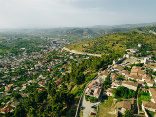 BERAT, ALBANIA, April 13, 2024: Berat castle viewed from boulevard Republika in Albania