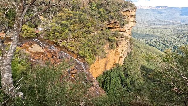 Landscape of Wentworth Falls is a three-tiered waterfall fed by the Jamison Creek, near the town of Wentworth Falls in the Blue Mountains region of New South Wales Australia - Nature Track Sydney Trip