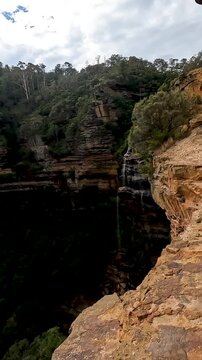 Landscape of Wentworth Falls is a three-tiered waterfall fed by the Jamison Creek, near the town of Wentworth Falls in the Blue Mountains region of New South Wales Australia - Nature Track Sydney Trip