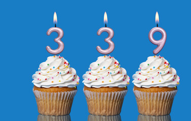 Birthday Cupcakes With Candles Lit Forming The Number 339
