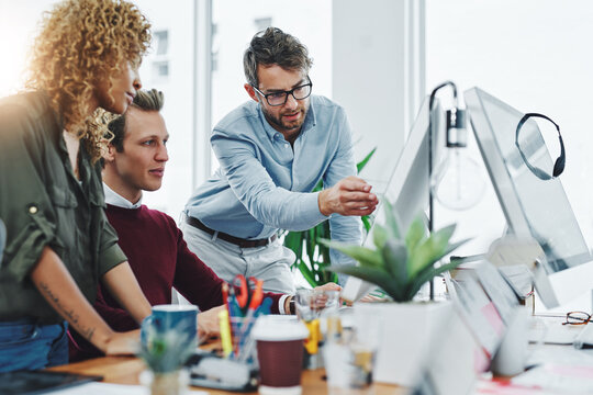 Business people, teamwork or computer for web design, help or brainstorming for proposal. Group, employees or coworkers with idea, planning or pc for project, conversation or online reading for email