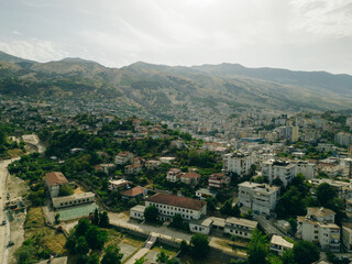 Fototapeta premium A view from the castle towards the center of the city of Gjirokaster, Albania in summertime