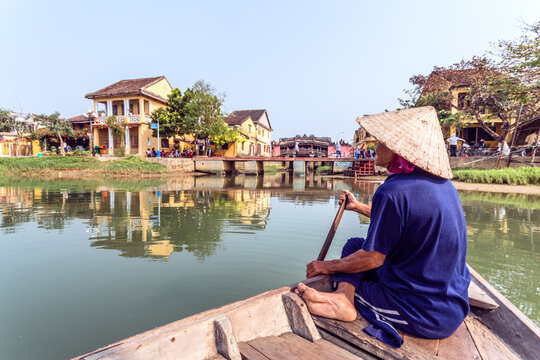 Vietnam, Hoi An. Old local fisherman on his boat