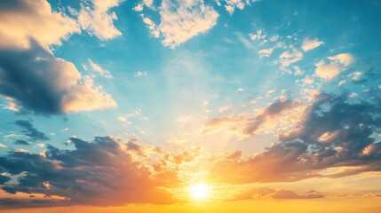 Fototapeta premium A beautiful sky during sunset with a blue background and fluffy clouds scattered across the horizon.