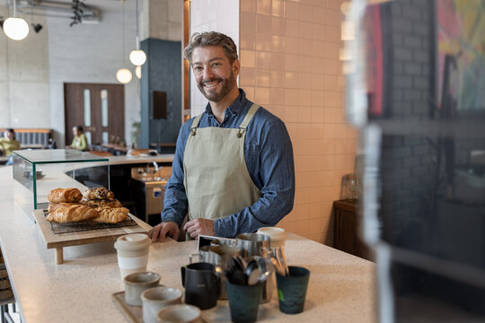 Portrait of a mature small business owner of a cafe