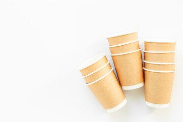 Stack of recyclable coffee paper cups, top view. Eco-friendly zero waste products