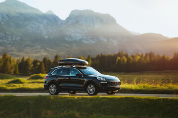 Black SUV with Roof Box for Ultimate Family Travel Experience