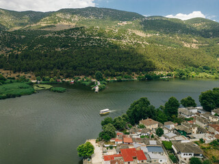 Fototapeta premium Aerial view of Ioannina Island on Ioannina Lake, Epirus region, Greece.