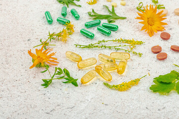 Obraz premium Plant based supplements, natural vitamins, fresh herbs and flowers. Organic ingredients medication