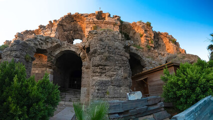 Ruins of the ancient city of Side. Ancient theater. View from the outside.