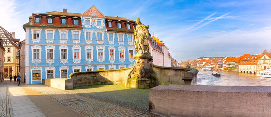 Panoramic sunny winter view of the Upper Bridge over the Regnitz River in Bamberg, Bavaria, German