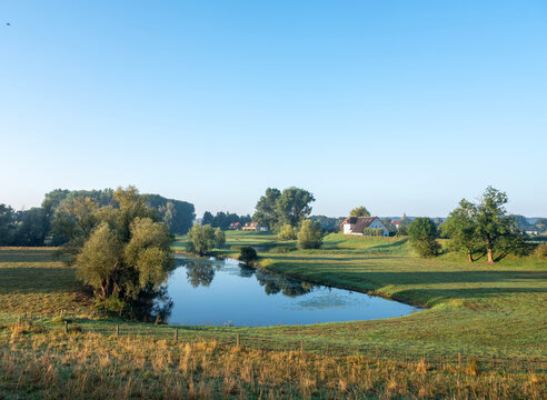 small lake at village of ooij in ooijpolder near nijmegen