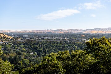 Scenic view of a suburban area with lush greenery and distant hills in Walnut Creek