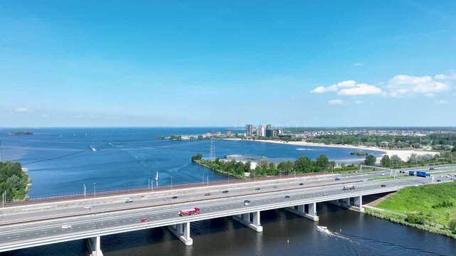 Aerial view of the Hollandse Brug A6 between Amsterdam and Almere with Almere Duin in the background