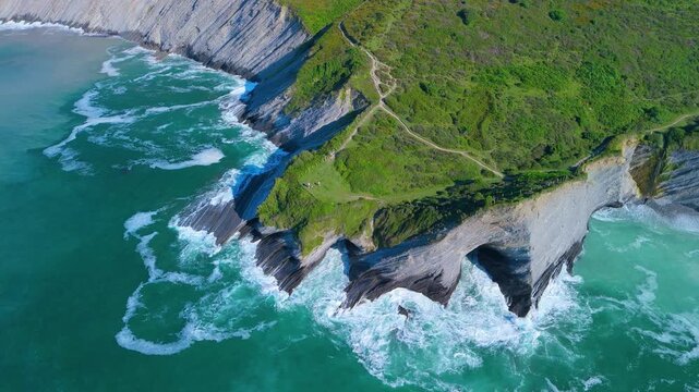 Flysch between Punta Mendata and Sakoneta beach at low tide. Aerial view from a drone on the Cantabrian Coast in Deva. Cantabrian Sea. Gipuzkoa Province. Basque Country. Spain. Europe
