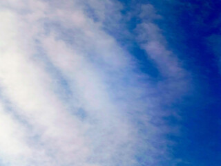 White clouds against a blue sky.