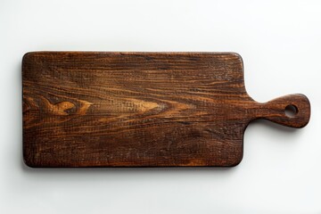 High angle view of dark brown rectangular wooden background with handle on top right isolated on white with soft shadows