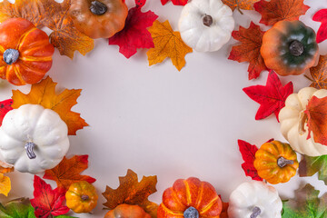 Obraz premium Autumn with pumpkins and fall leaves