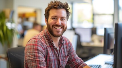 Cheerful Executive Reviewing Work on Computer