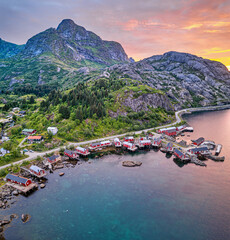 Fishing village Nusfjord at midnight sun - aerial view (Lofoten, Norway)