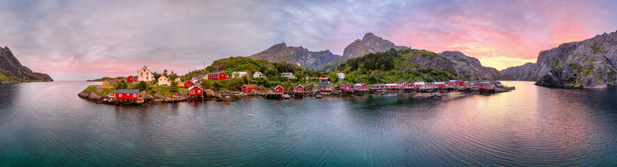 Fishing village Nusfjord at midnight sun - aerial panoramic view (Lofoten, Norway)