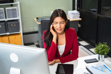 Tired asian businesswoman with headache at office, feeling sick and Chest pain, Woman feeling sick.