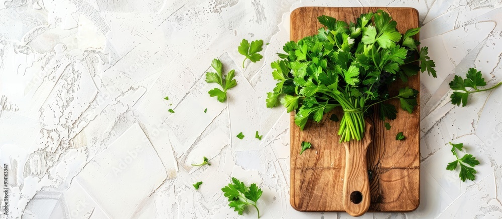 Poster Rectangular cutting board adorned with parsley leaves on a white background featuring copy space image