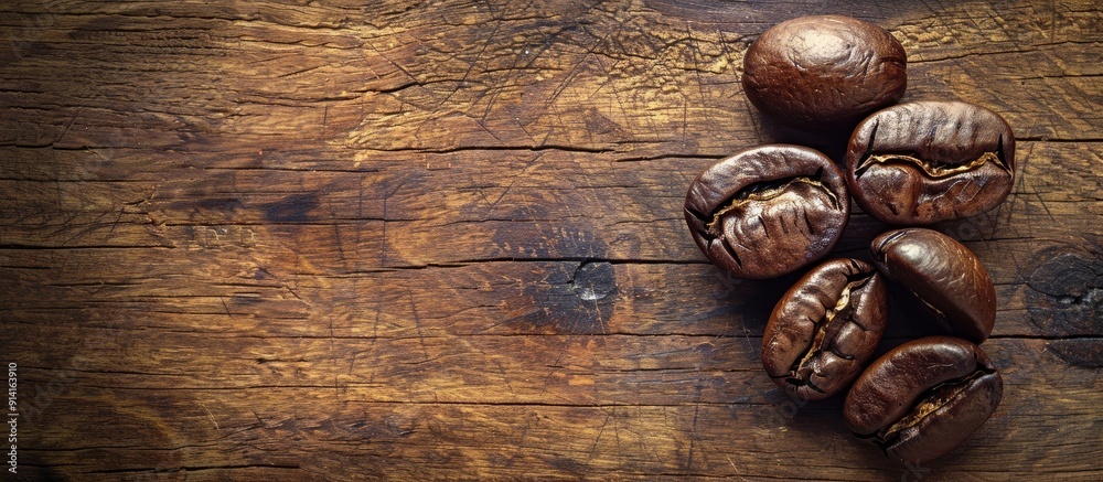 Aufkleber Retro vintage style coffee bean on wood background with a filter effect creating a captivating copy space image