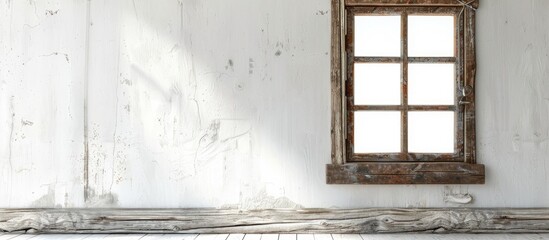 Vintage wooden window set against a white backdrop offering ample copy space image for rustic cottage house feel and showcasing the countryside s architectural texture