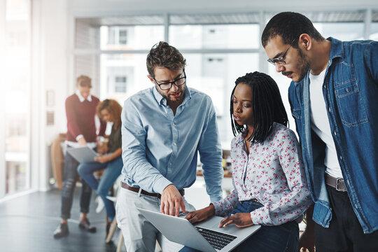 Employees, discussion and laptop for training in office, manager helping and internship advice. Staff, public relations agency and review diversity on press release, report and publicity coverage
