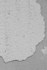 Concrete vs popcorn wall surface, close up. 
Covering popcorn wall with concrete surface.