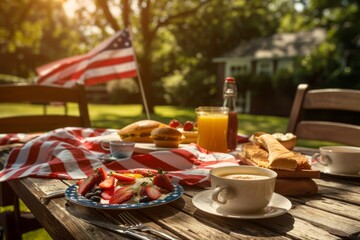 Outdoor breakfast on the table with American flag covering it on memorial day