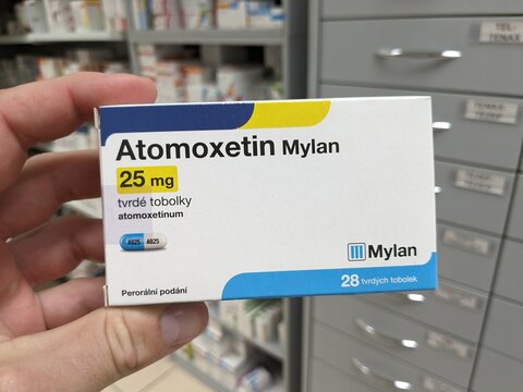 Prague,Czech Republic-August 7 2024: ATOMOXETIN MYLAN box of medication with ATOMOXETINE active substance by MYLAN,used for treatment of ADHD.