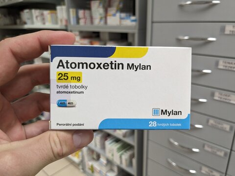 Prague,Czech Republic-August 7 2024: ATOMOXETIN MYLAN box of medication with ATOMOXETINE active substance by MYLAN,used for treatment of ADHD.