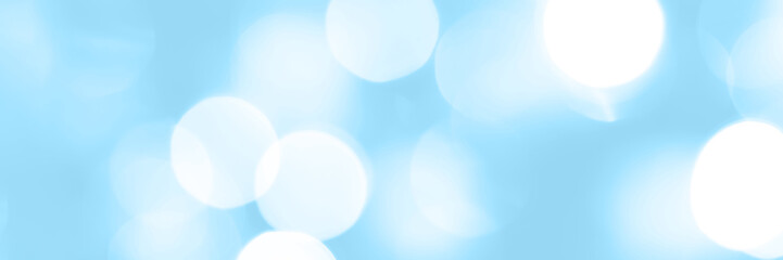 Blurred lights blue background, banner texture. Abstract bokeh with soft light header. Wide screen wallpaper. Panoramic web banner with copy space for design