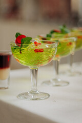 Welcome drink with cocktail glasses and drinks at an event. Alcoholic beverages at a wedding