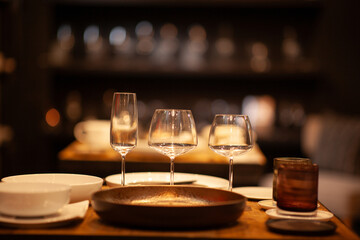 Close up on a table with luxury crockery, no people are visible.