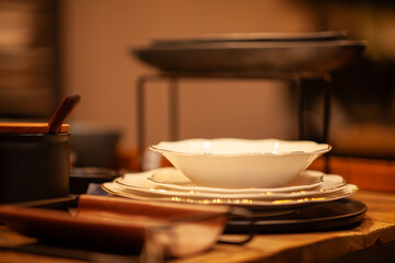 Close up on a table with luxury crockery, no people are visible.