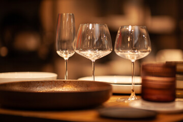 Close up on a table with luxury crockery, no people are visible.