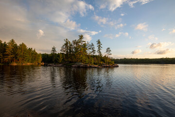 Naklejka premium Sunset over a lake in northern Ontario.