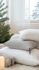 Fototapeta premium Soft winter accessories including a scarf, sweater, and gloves are arranged neatly on a light wooden surface